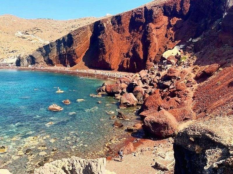 The Red Beach and the iron-stained cliff that gives it its colour
