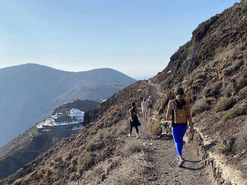 Walkers strung out along the caldera path between Fira and Oia